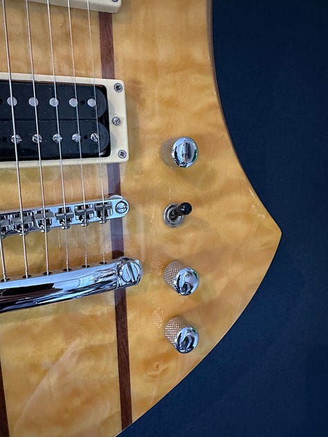 Control knob configurations on different guitars