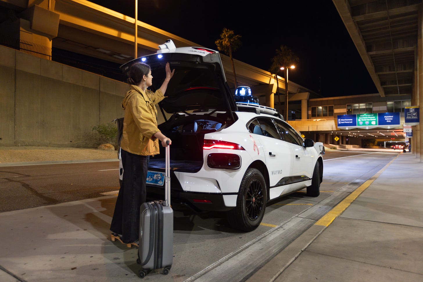Waymo launches curbside robotaxi pickup at Phoenix airport | TechCrunch