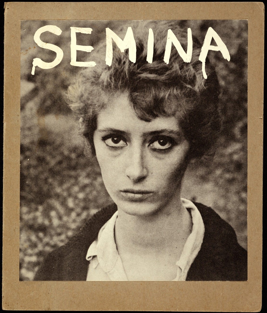 handprinted text semina on photograph of woman in black and white -- all mounted on cardboard handprinted text semina on photograph of woman in black and white -- all mounted on cardboard
