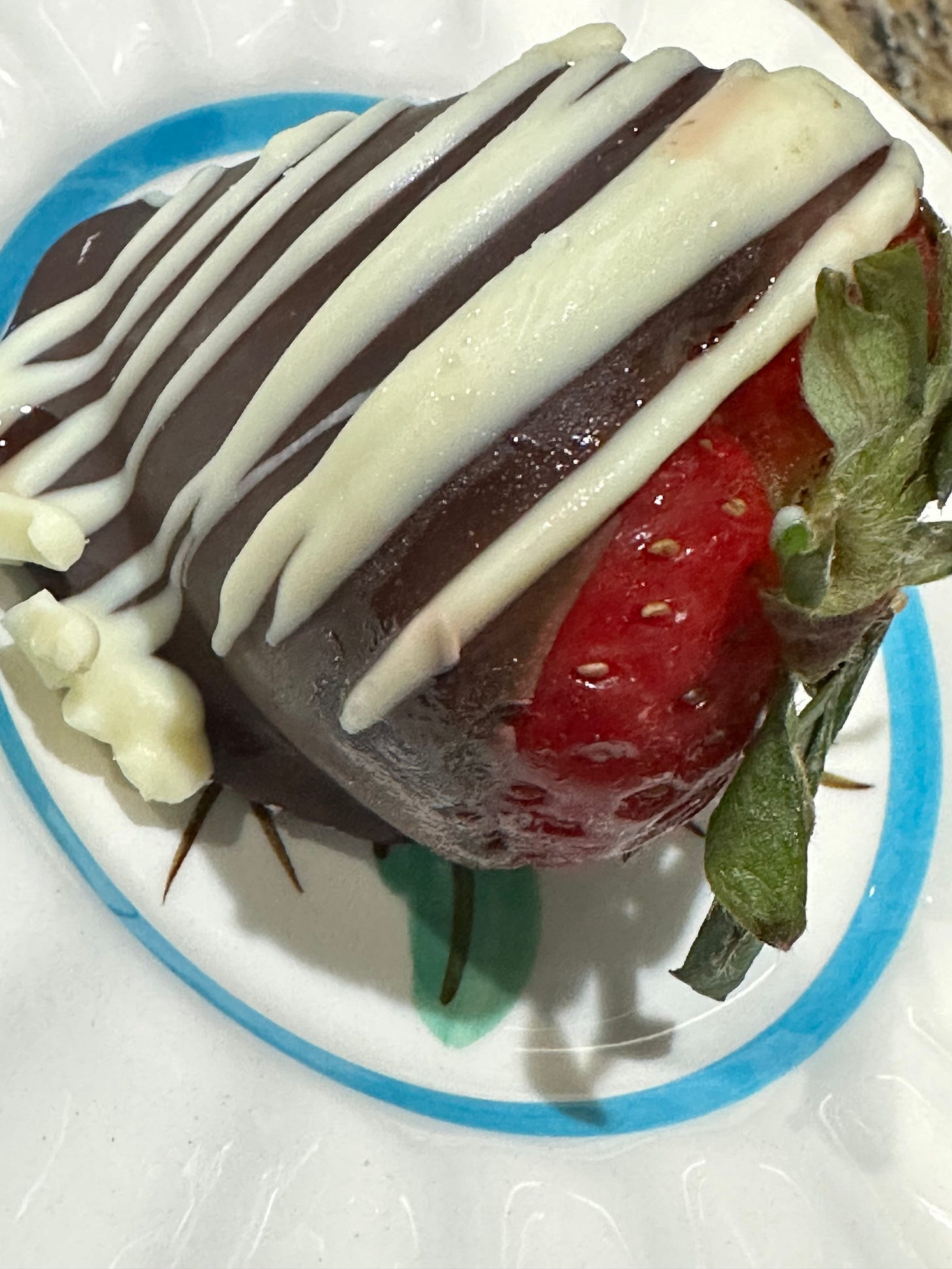 white and dark chocolate covered strawberry white and dark chocolate covered strawberry