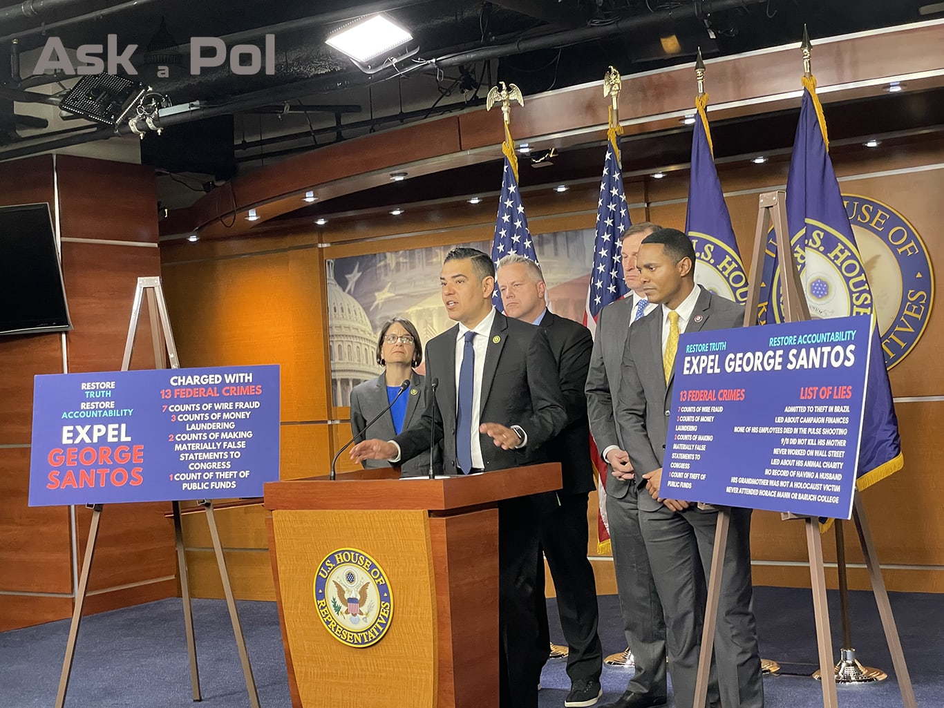 A politician in a suit addresses reporters from behind a podium in US House of Representatives. Photo Matt Laslo © www.askapol.com