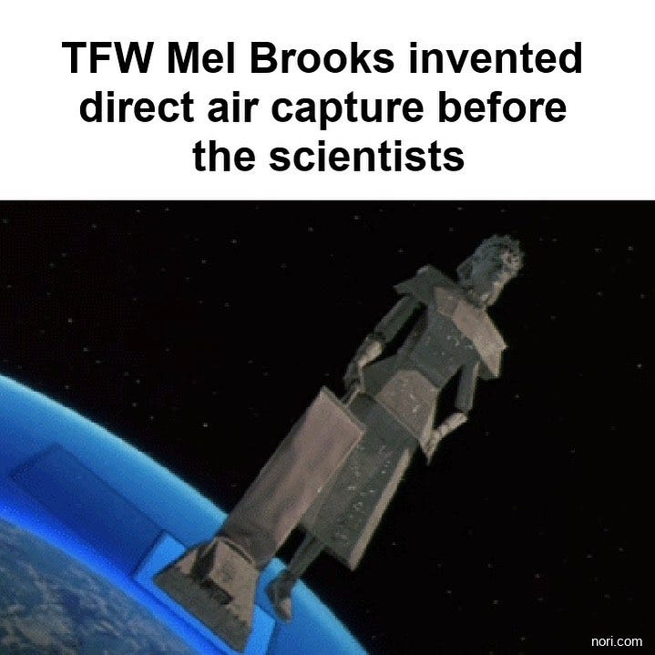 Text: "TFW Mel Brooks invented direct air capture before the scientists." Below, the giant Spaceballs ship-turned-robot floats above Planet Druidia, sucking up the air.