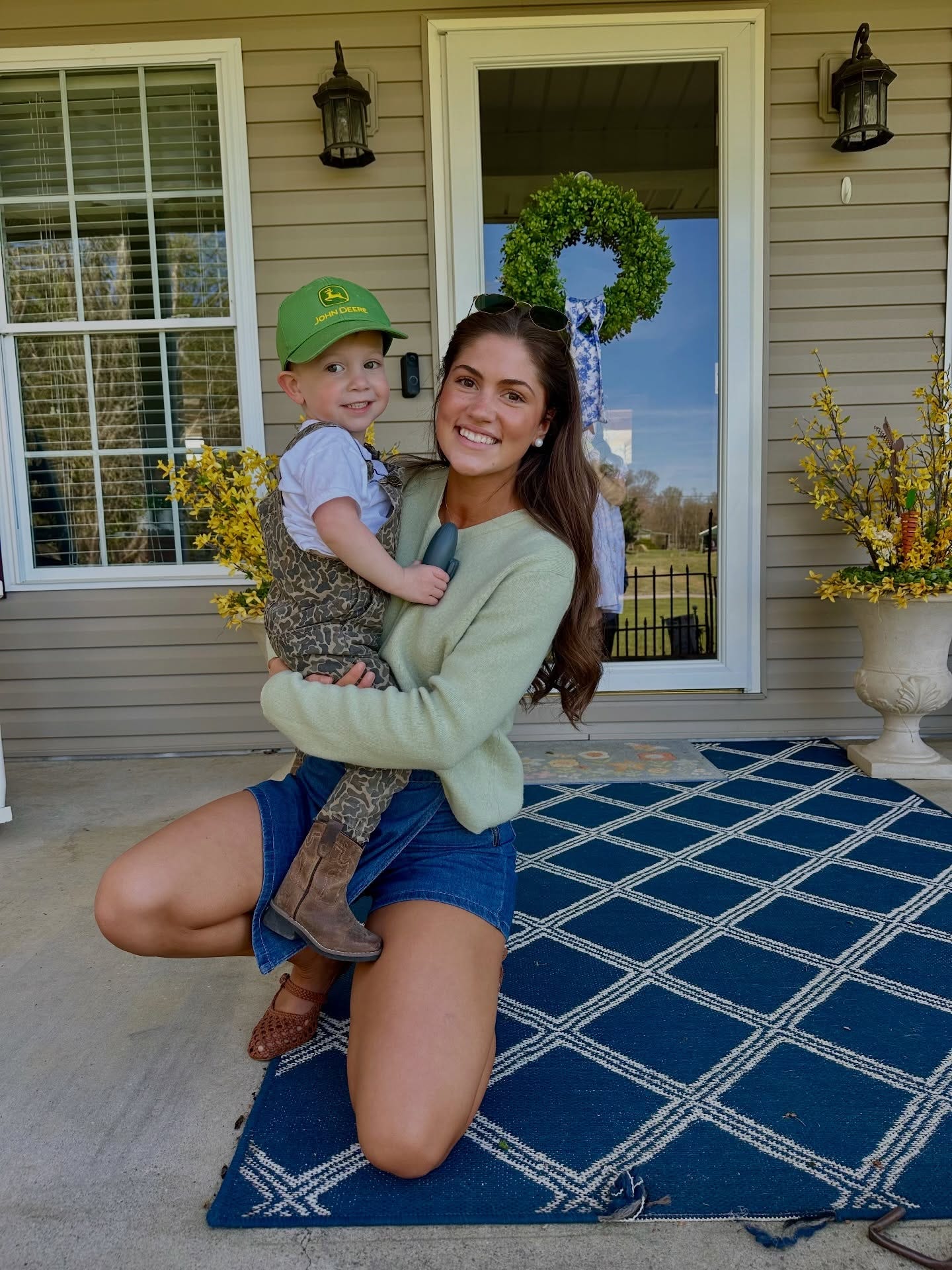 May be an image of baby and welcome mat