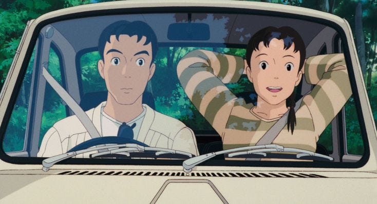 This may contain: two people sitting in the driver's seat of a car with trees in the background