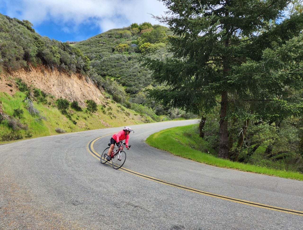 Patti Rogers leans into a curve on Bolinas Road. Photo by Dan Shryock