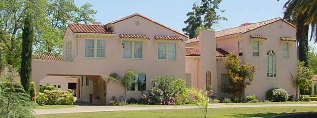 A house with a lawn and trees

AI-generated content may be incorrect.