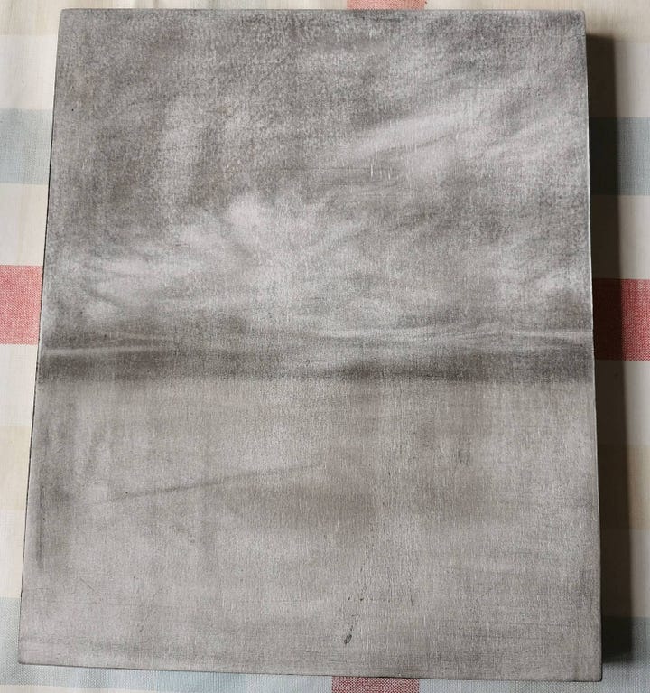 Charcoal drawings on wood panels.n 