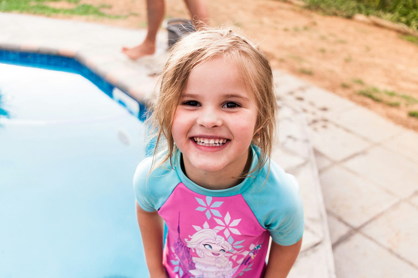 smiling little girl in pool