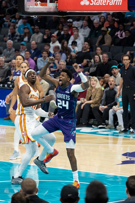 Frame by Frame: Hornets guard Brandon Miller dunks over Atlanta Hawks center Onyeka Okongwu. (Jorge Torres for Y’all Weekly)