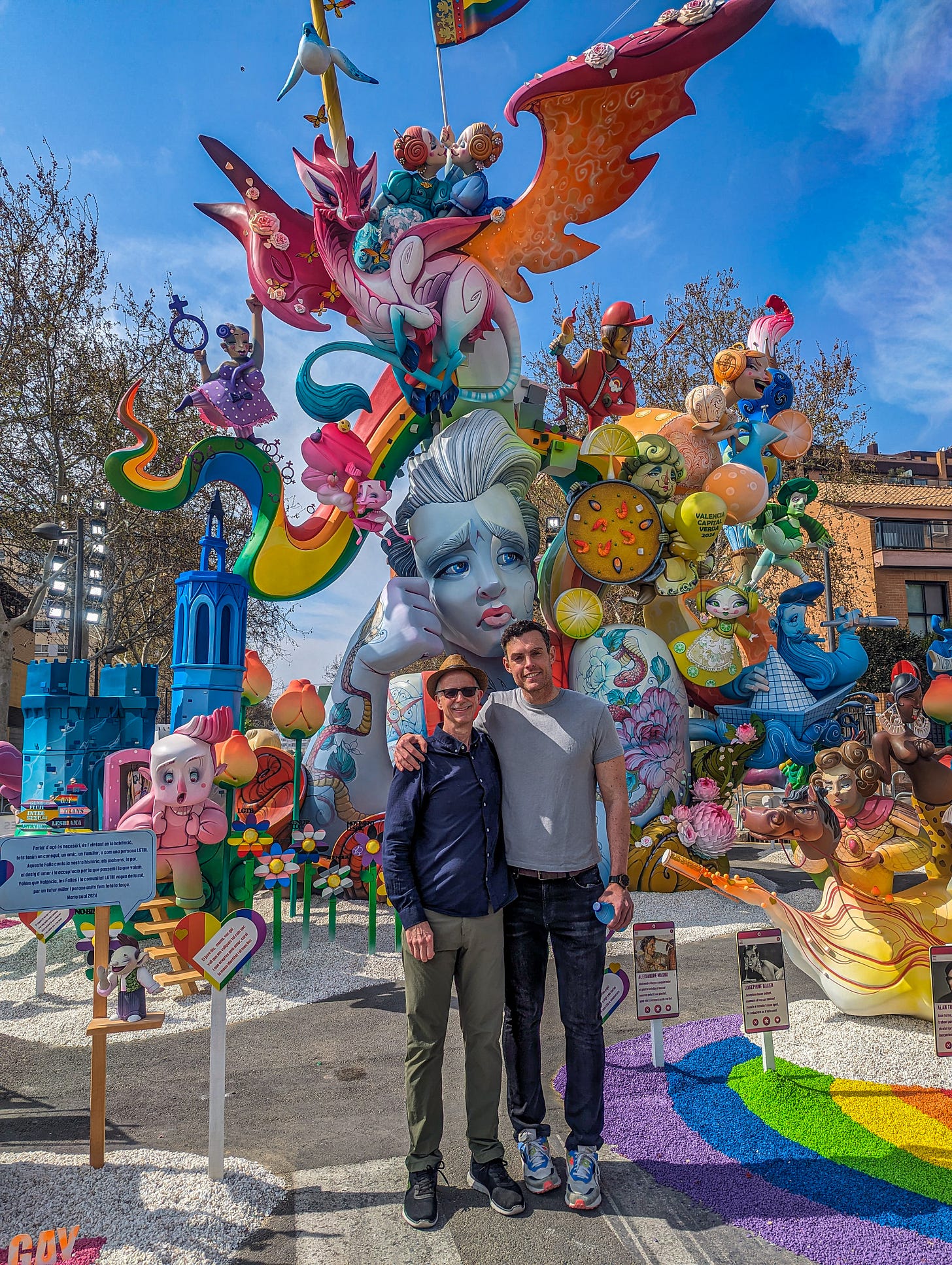 Michael and Mario posing in front of Mama, soy gay. 