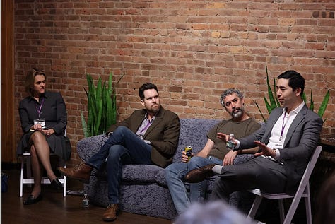 Meghan Daum hosting an Unspeakeasy retreat weekend in New York City with attendees in conversation around a table