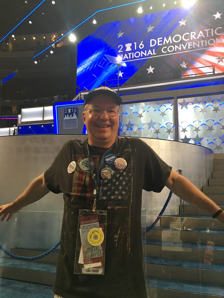 My Journey with Bernie book, DNC 2016, Independence Hall, Green glow-in-the-dark shirts, 2016 DNC Delegate Badge, Delegates, Protestors, and Volunteers in Philadelphia, Lighted FEEL THE BERN Shirt