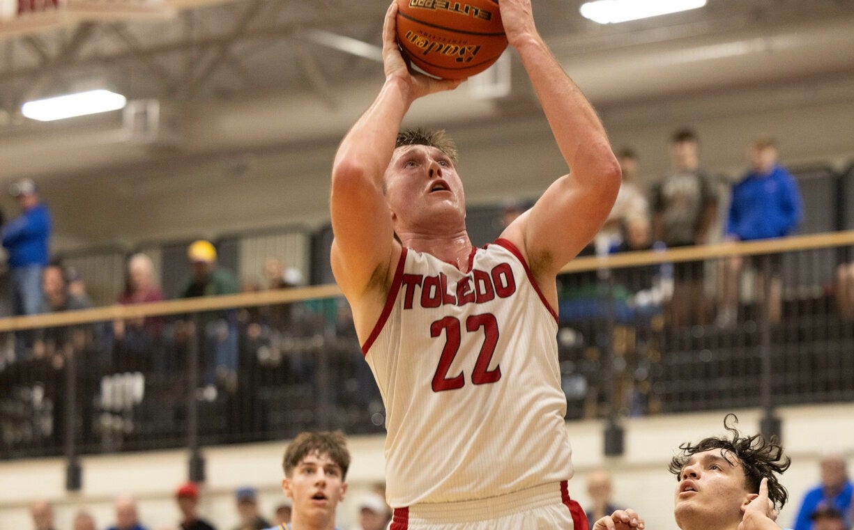 Toledo's Cooper Fallon shoots an open layup during Toledo's loss to Adna on Jan. 17.