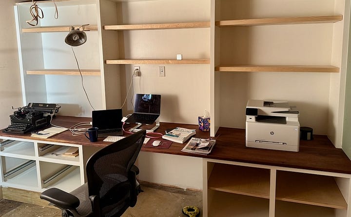 Custom cabinet with double-thick bookshelves.
