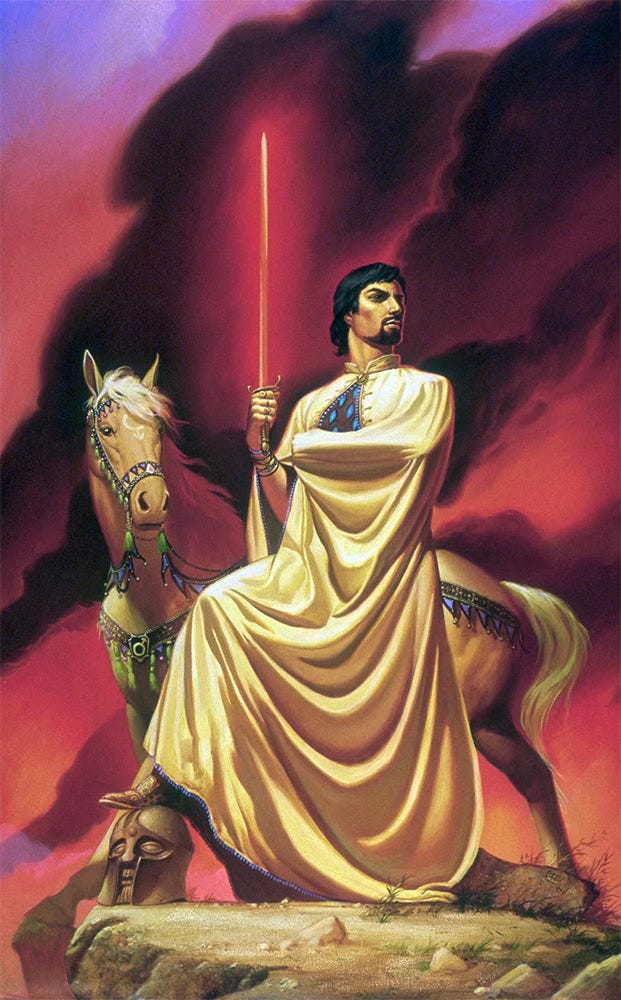 With white cloak wrapped closely around him, the incarnation of War holds up a glowing red sword against a backdrop of angry black and crimson sky. His hair and goatee are jet black and his skin olive toned. His foot rests on a helmed head, which seems to be made of stone, resting at the edge of a cliff. Behind him a tan horse with white mane turns its head to the audience. On its forehead, the sign of Mars—a circle with single arrow—points downward toward its nose.