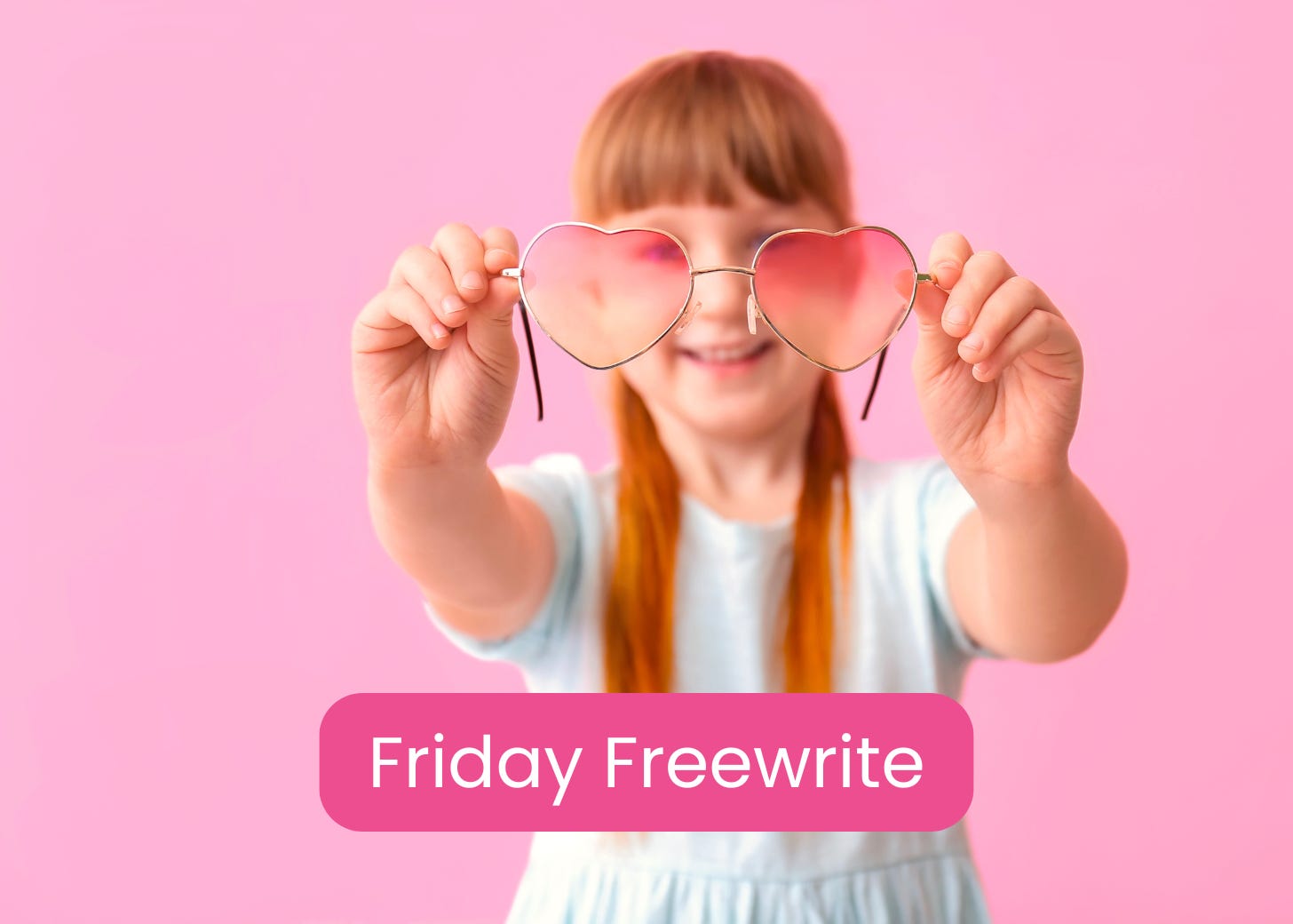child holding rose-colored glasses