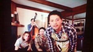 Misha looking good in an apron...