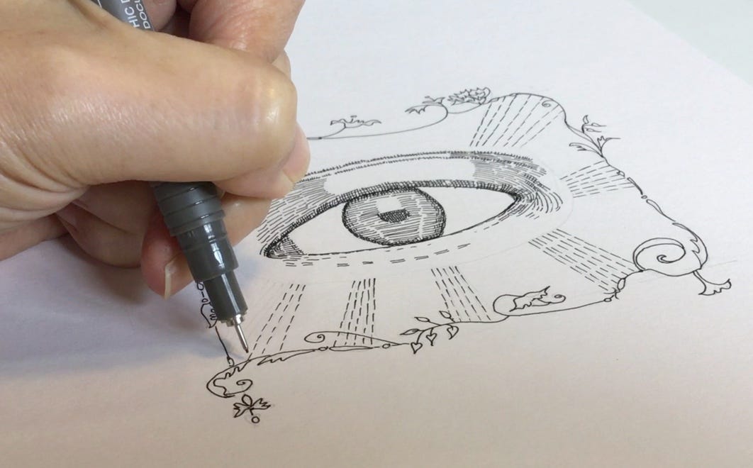Close up of my hand drawing the artwork “Precious In His Eyes”