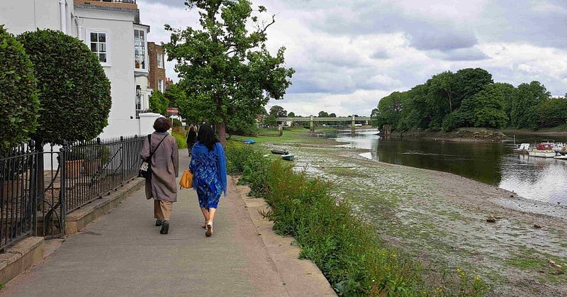 Strolling along the Strand On The Green river path London