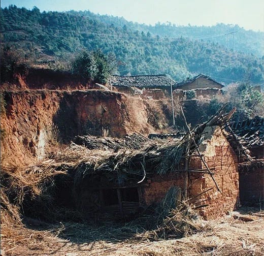 A rural house made out of poor materials on the outskirts of Mayelin next to the roadside having partially collapsed due to the shockwave. A rural house made out of poor materials on the outskirts of Mayelin next to the roadside having partially collapsed due to the shockwave.