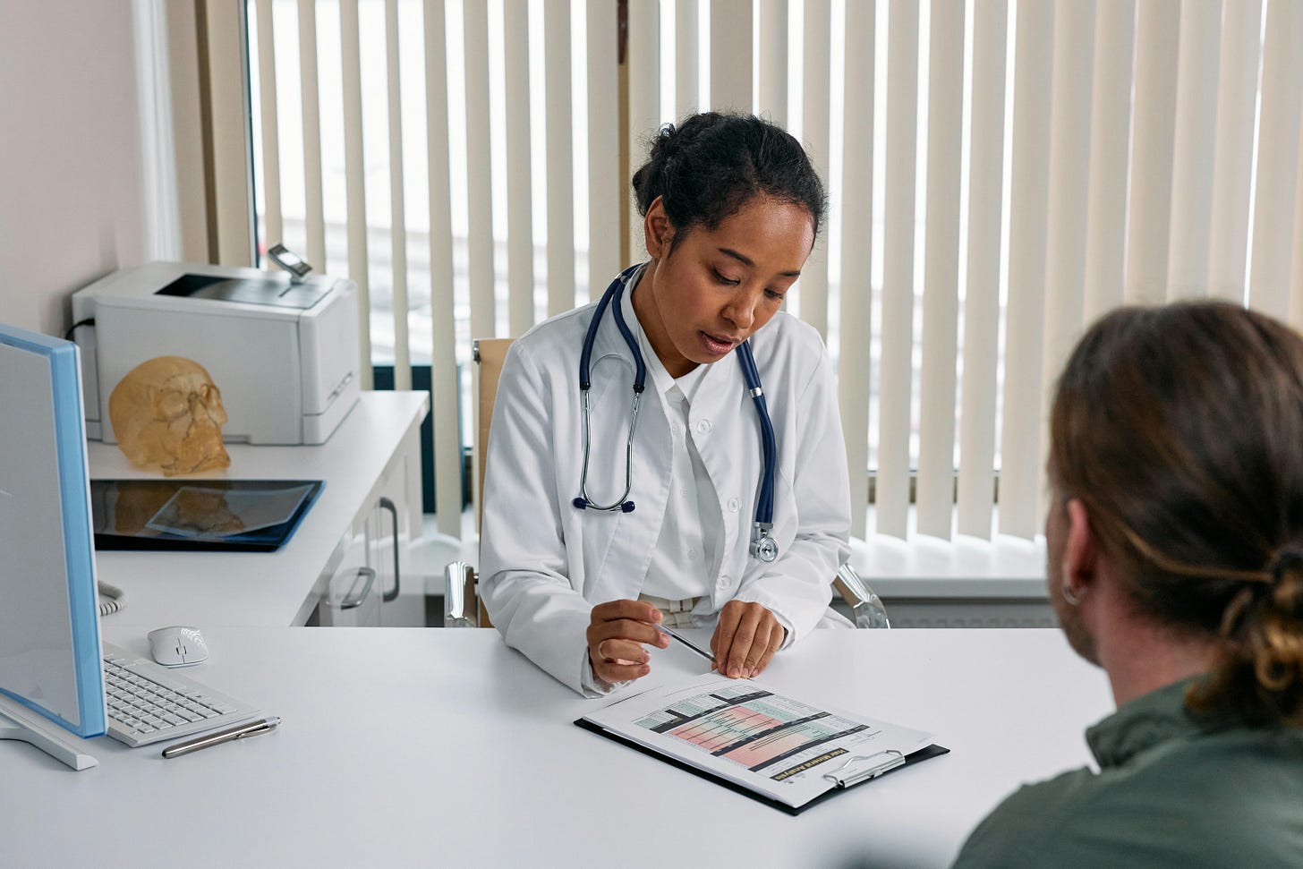 Doctor consulting with a patient about lifestyle changes to improve health.