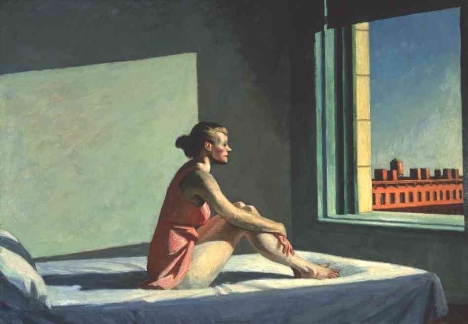 Lone woman looking out a window. Lone woman looking out a window.