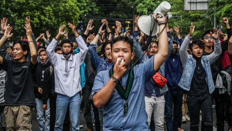 Protestors outside Indonesia's parliament on Tuesday. Protestors outside Indonesia's parliament on Tuesday.
