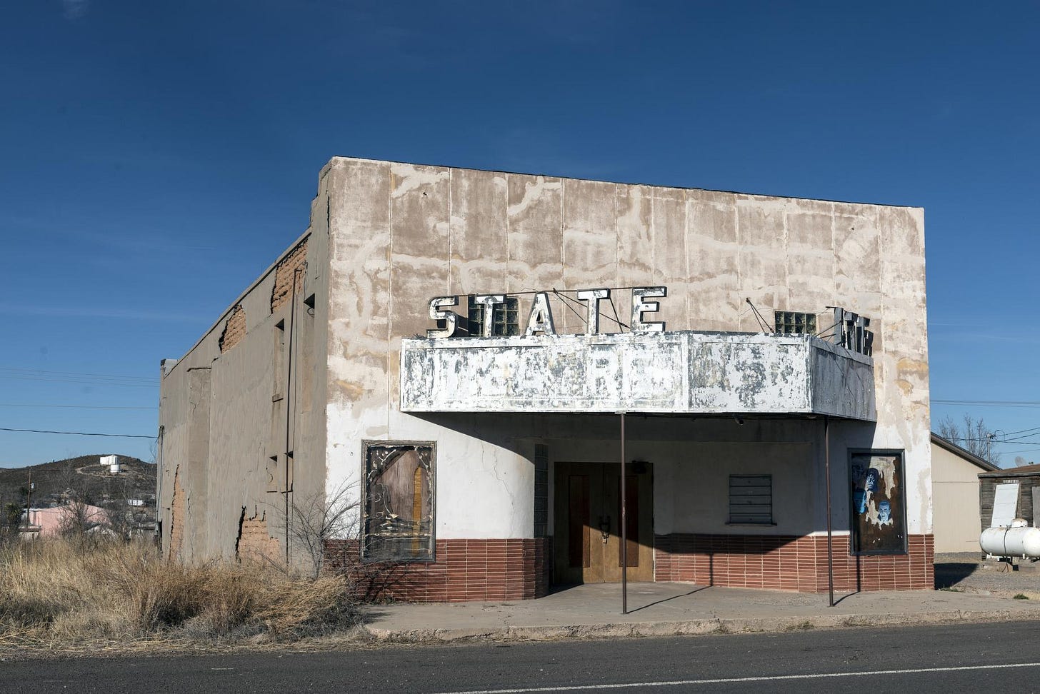 An abandoned movie theater in Sierra Blanca, made a virtual ghost town when the interstate highway bypassed it in Hudspeth County, Texas | Library of Congress An abandoned movie theater in Sierra Blanca, made a virtual ghost town when the interstate highway bypassed it in Hudspeth County, Texas | Library of Congress