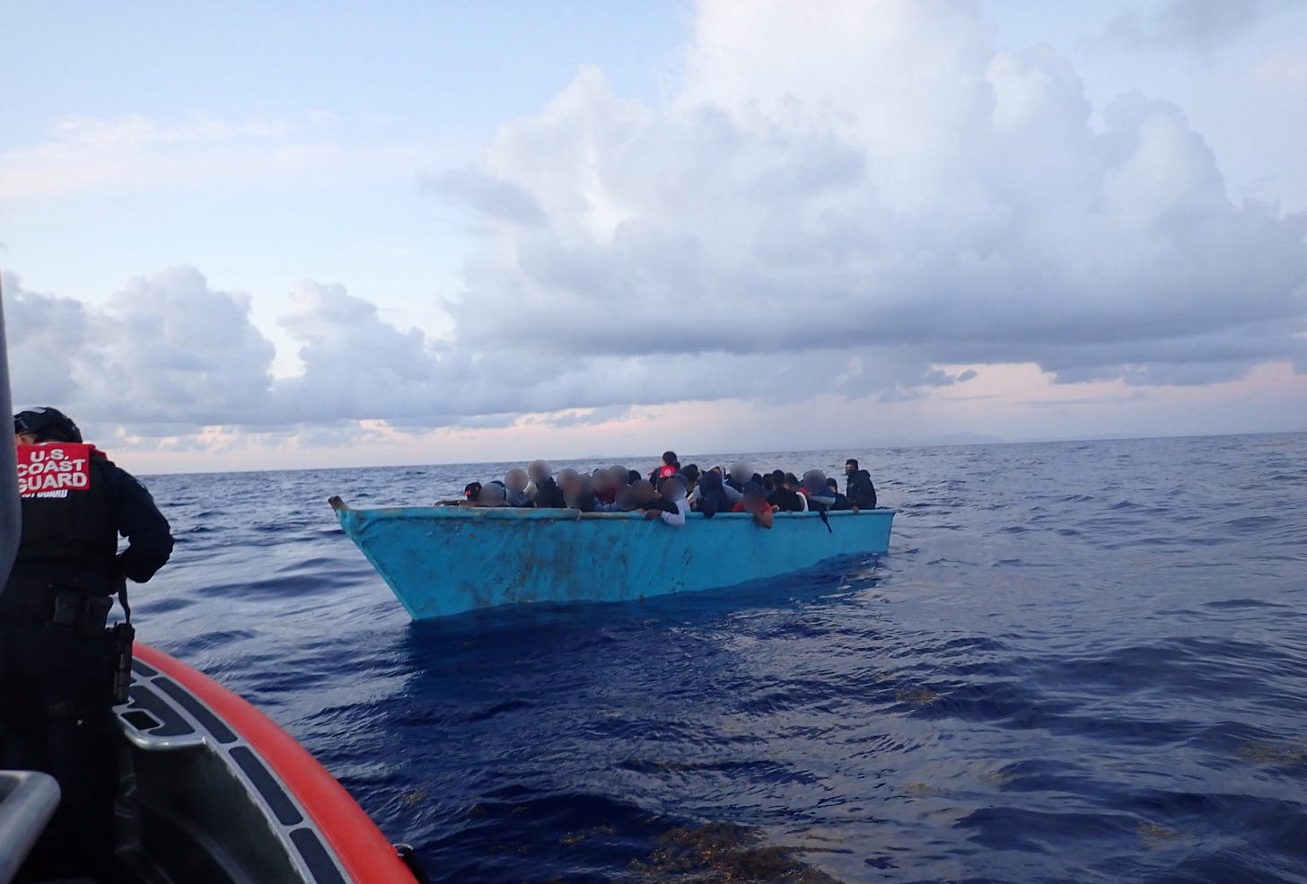 61 migrants aboard this cartel human smuggling vessel were rescued by the US Coast Guard and the Dominican Republic Navy. (US Defense Department photo) 61 migrants aboard this cartel human smuggling vessel were rescued by the US Coast Guard and the Dominican Republic Navy. (US Defense Department photo)