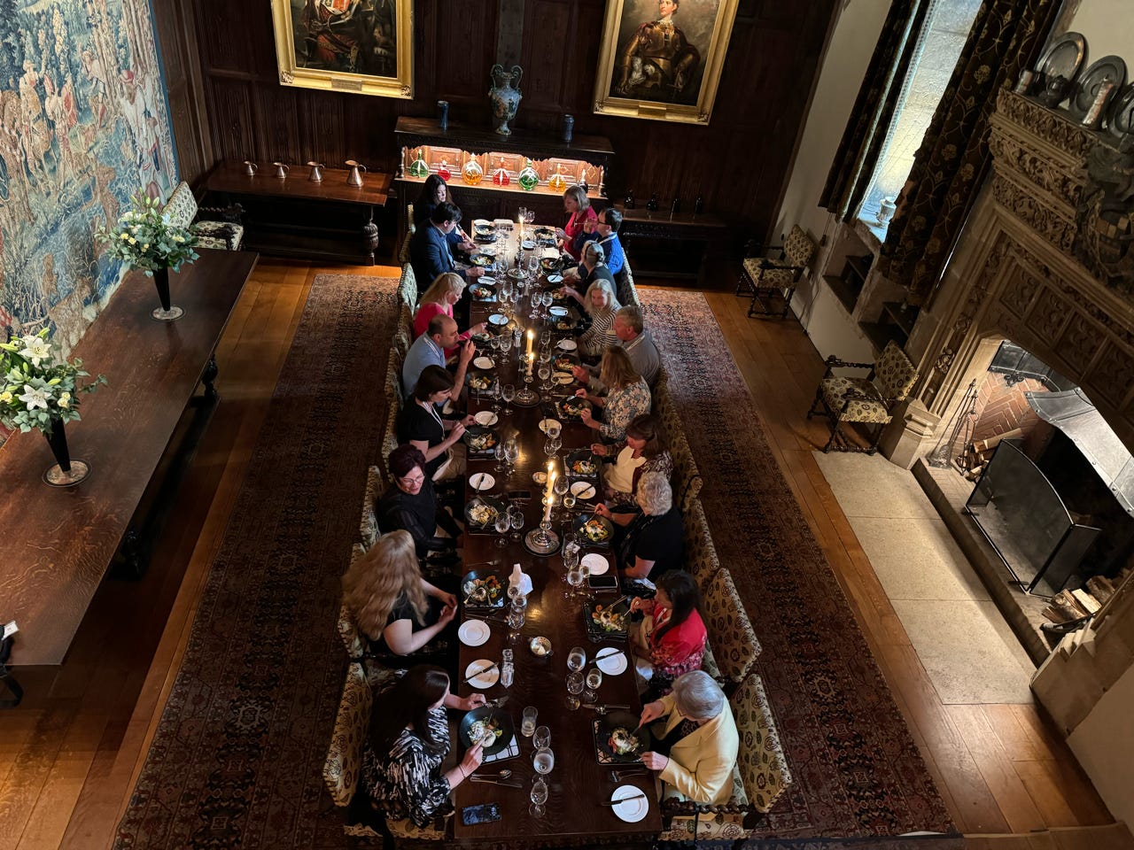 The Anne Boleyn Tour group 2025 eating in the Great Hall of Hever Castle