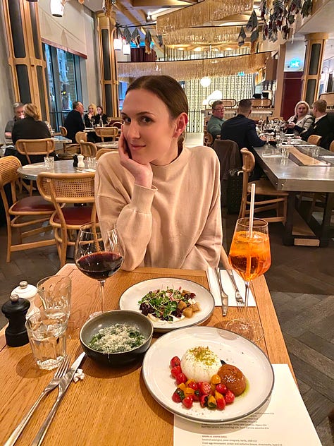 I enjoyed yummy food in London like ice cream cones, cinnamon roles, and good wine.