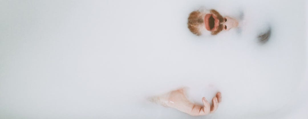 person on bath tub showing beard person on bath tub showing beard