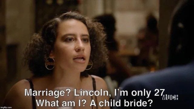 This may contain: a woman talking to another person in a room with other people and text that reads marriage lincoln, i'm only 27 what am i? a child bride?
