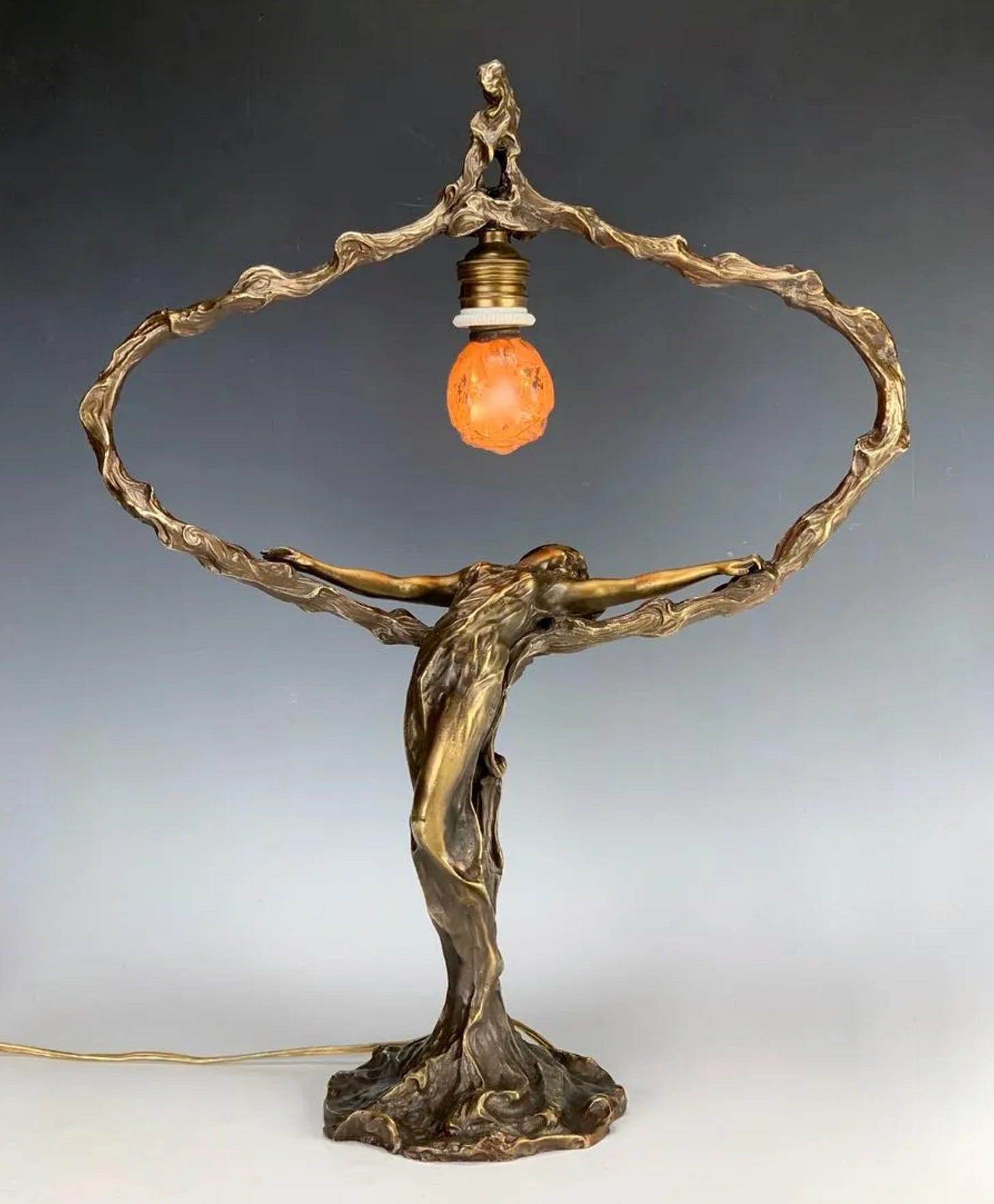M Méliodon, A Metamorphosis of a Lady into a Tree, gilt bronze lamp, 53 cm H. © Treasure Seeker auction, Pasadena (USA), lot #0101, 2021-04-18. M Méliodon, A Metamorphosis of a Lady into a Tree, gilt bronze lamp, 53 cm H. © Treasure Seeker auction, Pasadena (USA), lot #0101, 2021-04-18.