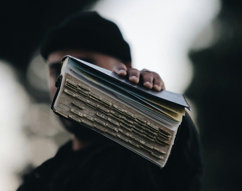 person holding book