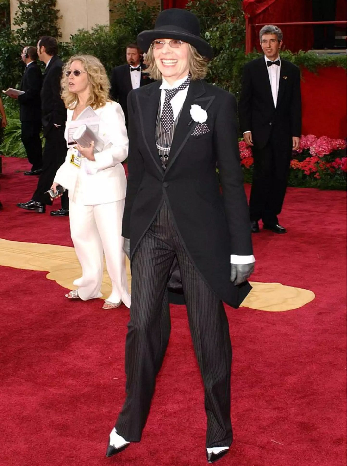Diane Keaton on the red carpet of the 76th Annual Academy Awards wearing a full suit.