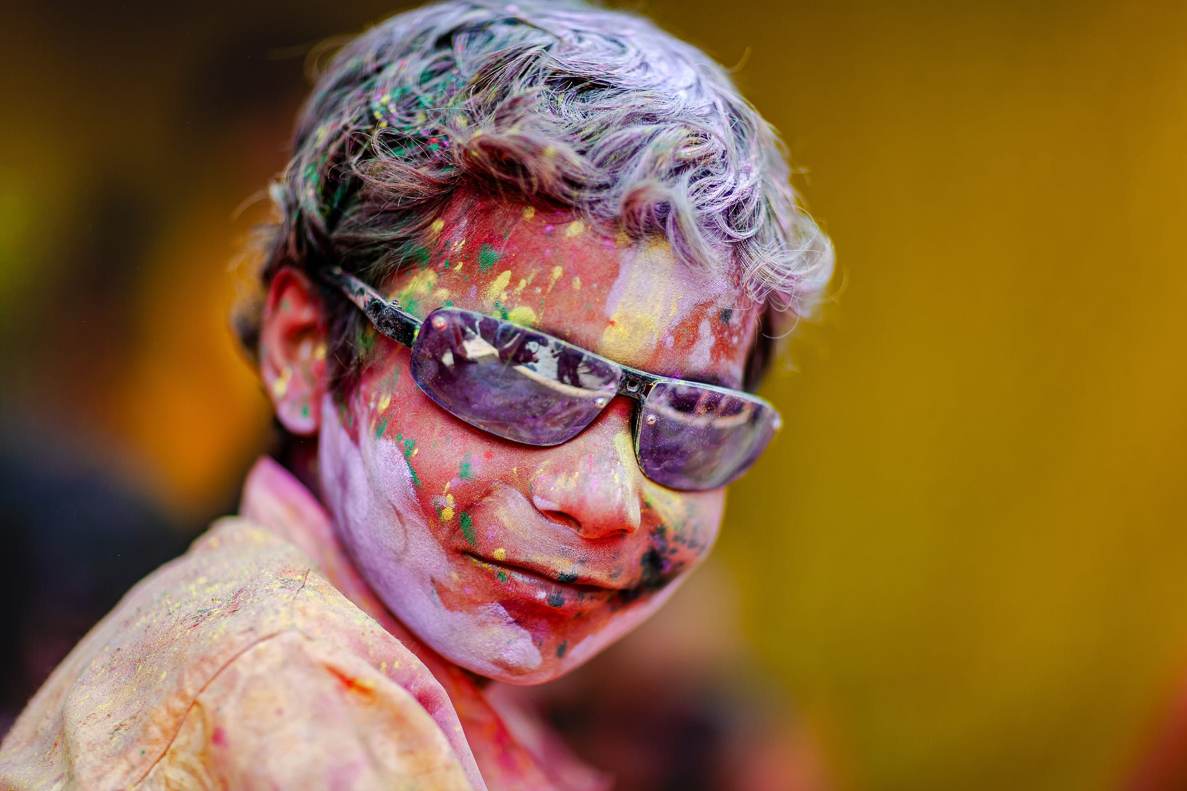 A young man at a Holi festival celebration, Nandgaon, Uttar Pradesh, India. 1/800, ƒ/1.2, ISO 50, 85mm. © Gavin Gough A young man at a Holi festival celebration, Nandgaon, Uttar Pradesh, India. 1/800, ƒ/1.2, ISO 50, 85mm. © Gavin Gough