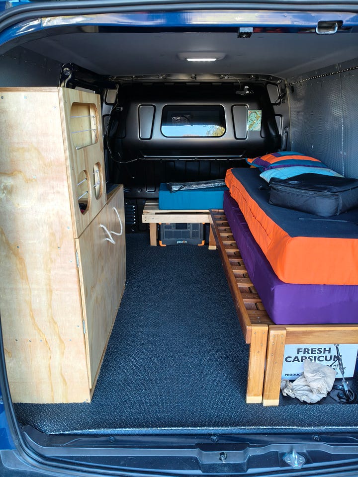 Insulating the van wheel arch and carpet on the floor in the back of the van