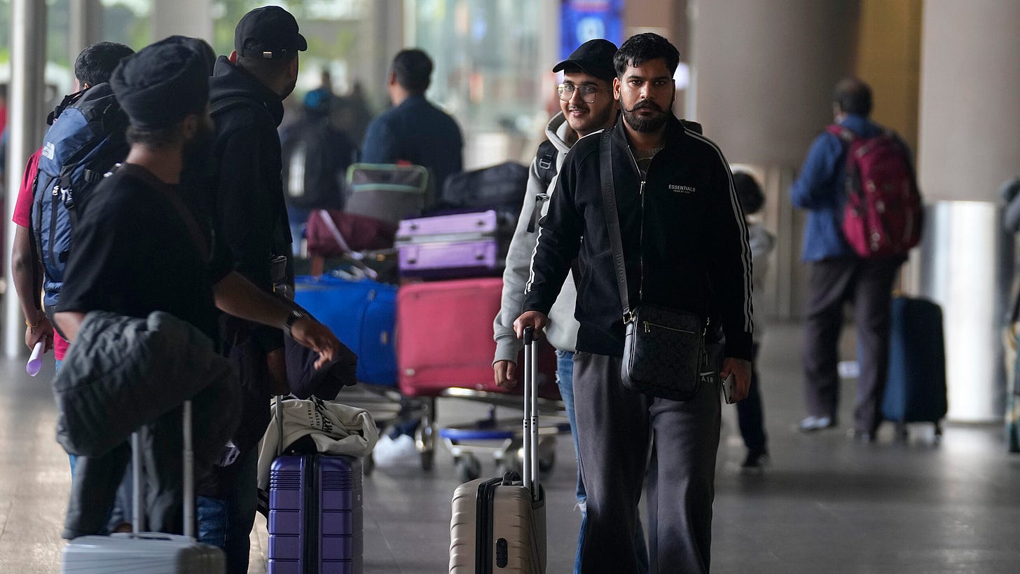 276 Indians stuck in a French airport for a human trafficking probe arrive  in India - WPR