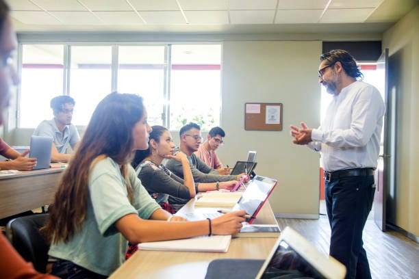 College teacher in class College teacher in class