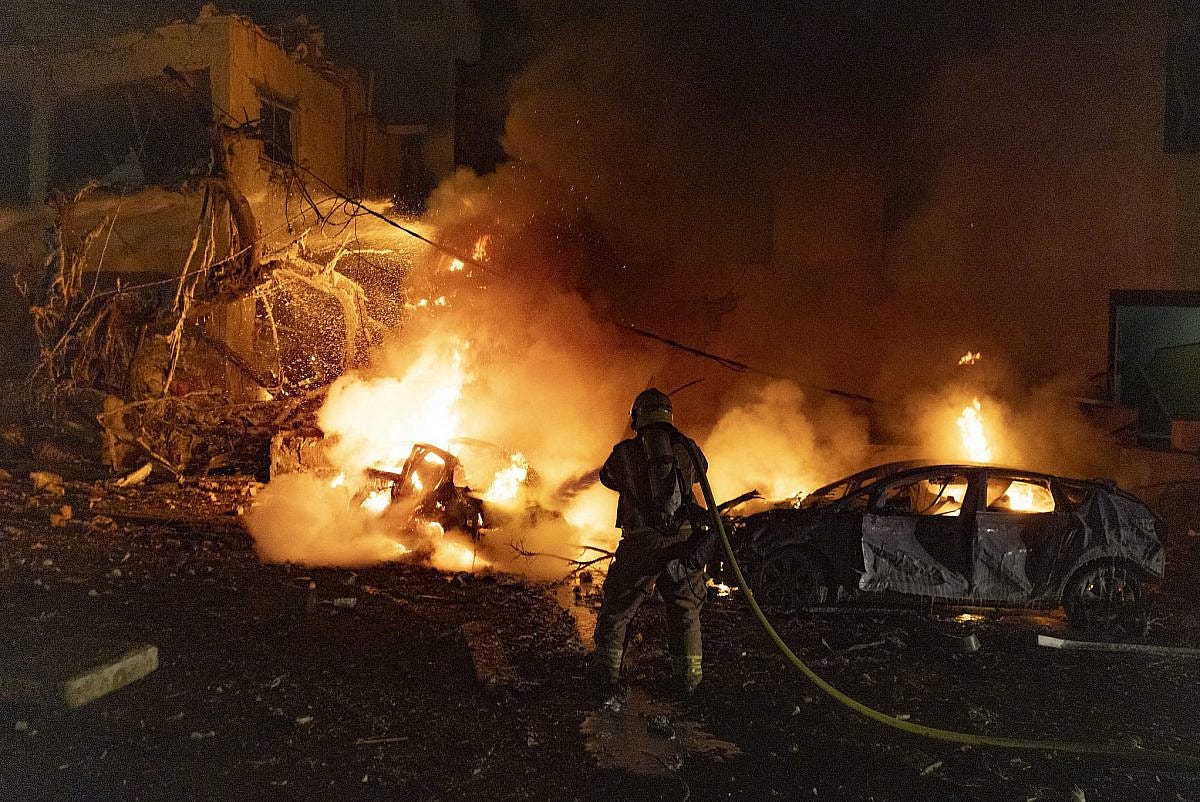 Israeli rescue forces at the scene where an Iranian ballistic missile hit a residential area in central Tel Aviv, February 28, 2026. (Chaim Goldberg/Flash90) Israeli rescue forces at the scene where an Iranian ballistic missile hit a residential area in central Tel Aviv, February 28, 2026. (Chaim Goldberg/Flash90)