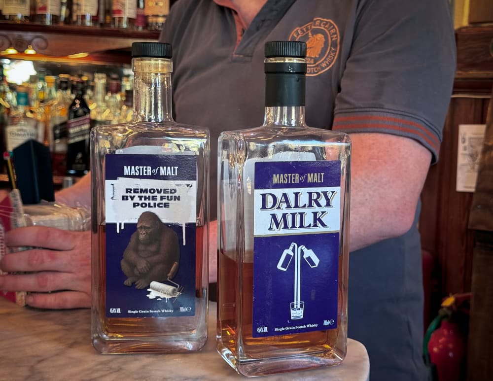 The two whisky bottles on the bar The two whisky bottles on the bar