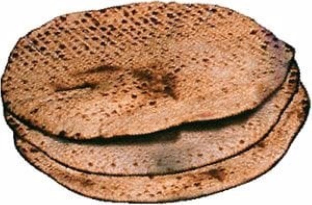 Three round, handmade matzah Three round, handmade matzah