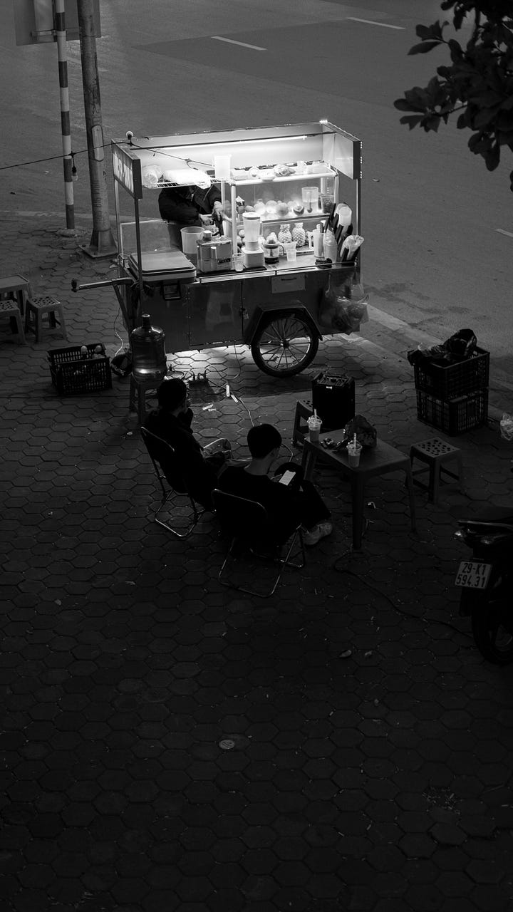 Shared meal and Street Food Cart. Photos by Nguy n hi p and Brett Wharton via Unsplash.
