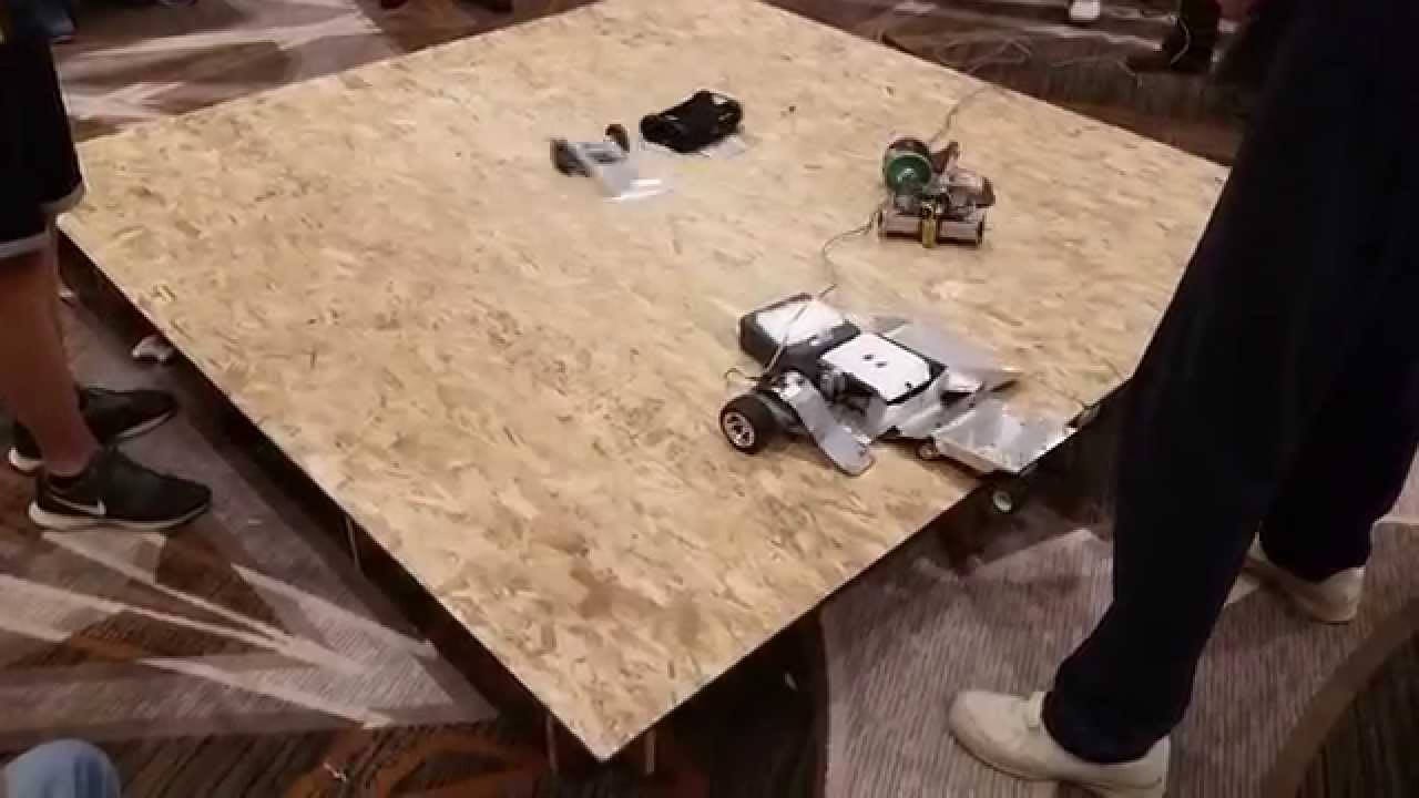 Grainy vintage photo of robotic combat from the Critter Crunch. Grainy vintage photo of robotic combat from the Critter Crunch.