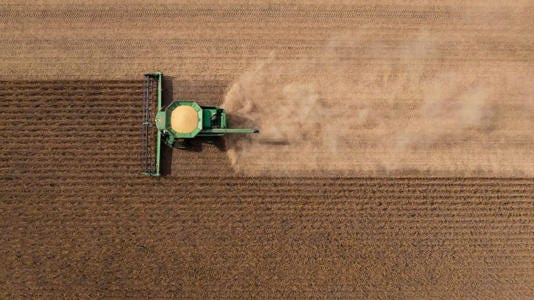 A combine harvester during a soybean harvest at a farm outside St. Peter, Minnesota. - Ben Brewer/Bloomberg/Getty Images