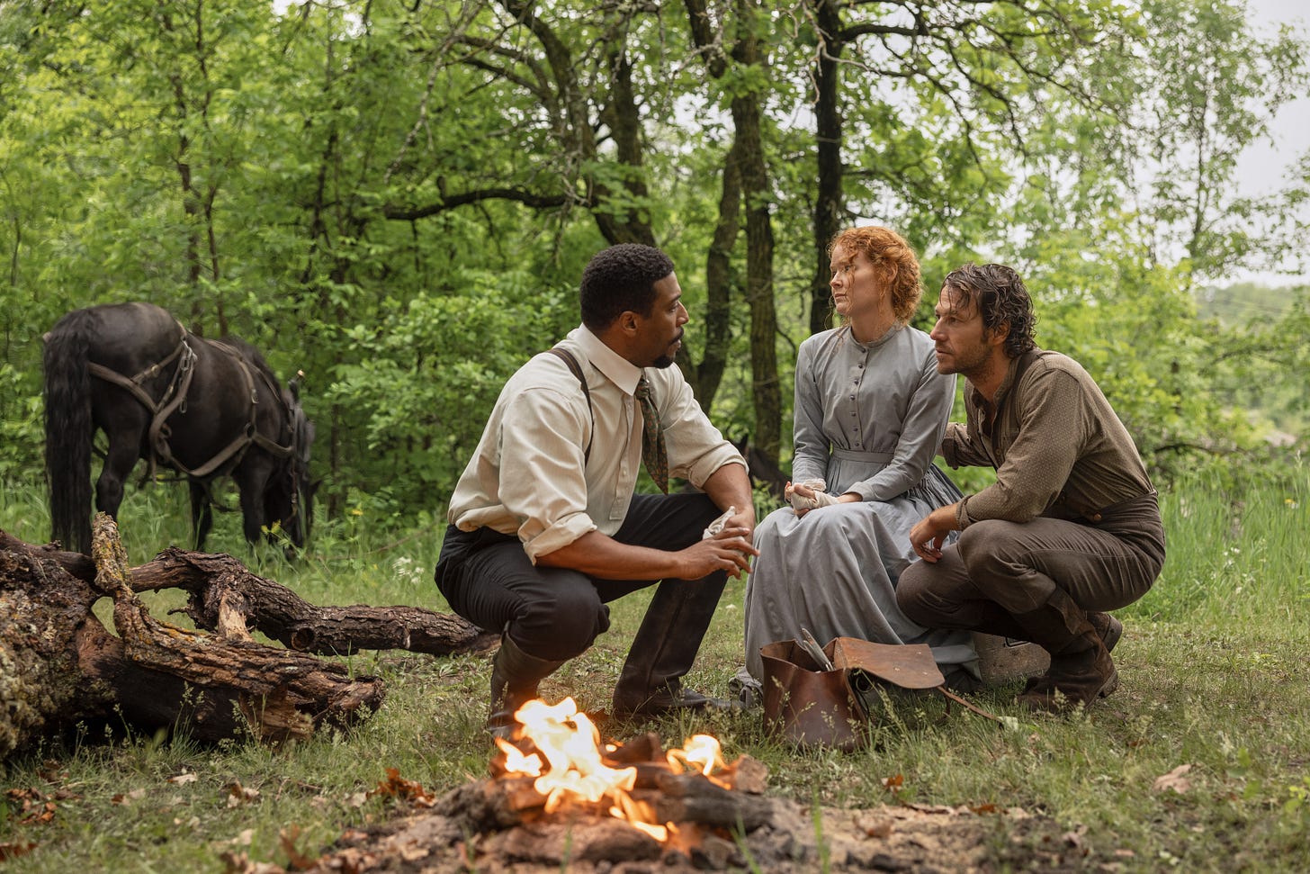 Little House on the Prairie. (L to R) Jocko Sims as Dr. George Tann, Crosby Fitzgerald as Caroline Ingalls, Luke Bracey as Charles Ingalls in episode 101 of Little House on the Prairie. Cr. Eric Zachanowich/Netflix © 2026 Little House on the Prairie. (L to R) Jocko Sims as Dr. George Tann, Crosby Fitzgerald as Caroline Ingalls, Luke Bracey as Charles Ingalls in episode 101 of Little House on the Prairie. Cr. Eric Zachanowich/Netflix © 2026