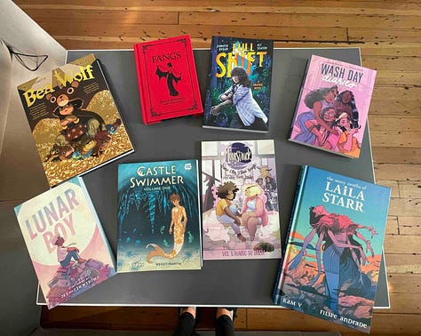 5 images with books being held by a hand and a tabletop covered in Graphic Novels. Titles include: Belly Full of Heart; In Limbo; Special Topics in Being a Parent; Viewfinder; Princess Princess