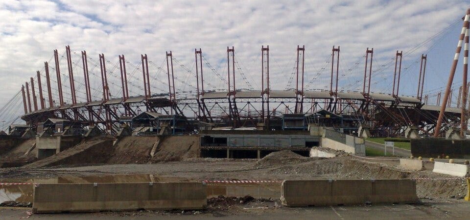 The Stadio delle Alpi in Turin, Italy being demolished in 2009. it was the former stadium of Juventus. The Stadio delle Alpi in Turin, Italy being demolished in 2009. it was the former stadium of Juventus.