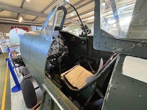 Inside Britain’s Spitfire and Hurricane Museum visitors walk through the preserved memory of the Second World War. Restored Supermarine Spitfires stand beside the weapons, uniforms, flight equipment and personal artefacts of the young pilots who flew them. From cockpit instruments and oxygen masks to bombs mounted beneath the aircraft’s wings, the collection reveals both the engineering brilliance and the human stories behind the fighter that became a symbol of Britain’s survival during the Battle of Britain.